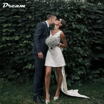 КОРОТКОЕ атласное мини-свадебное платье DREAM с V-образным вырезом, большим бантом, открытой спиной, без рукавов Длиной выше колена 1
